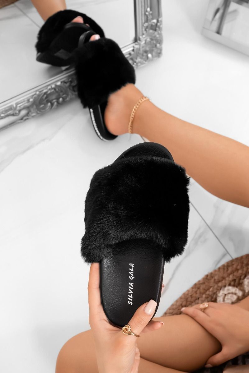 Black slip-on sandals with faux fur and rhinestone trim