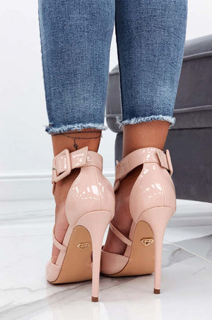 Pink patent leather pumps with stiletto heel and buckle