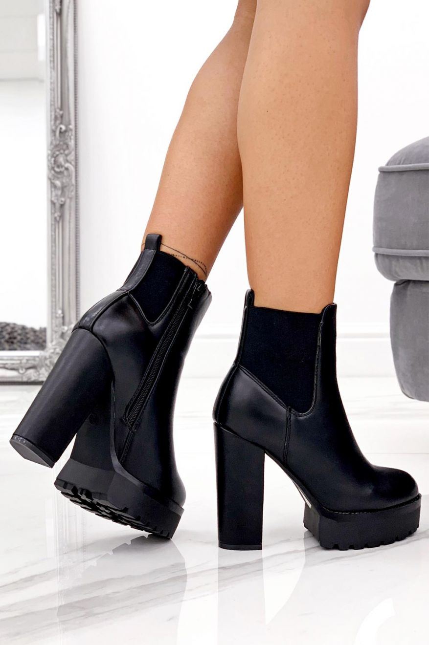 Black ankle boots with high heel and side elastic