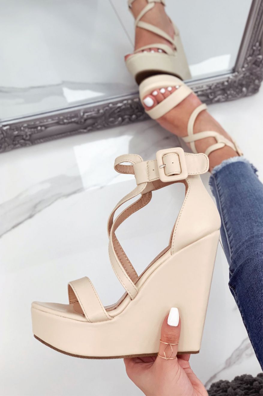 Beige faux leather wedge sandals