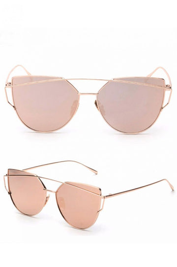 Gold metal sunglasses with pink lenses