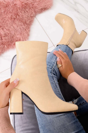 Beige python ankle boots with comfortable heel