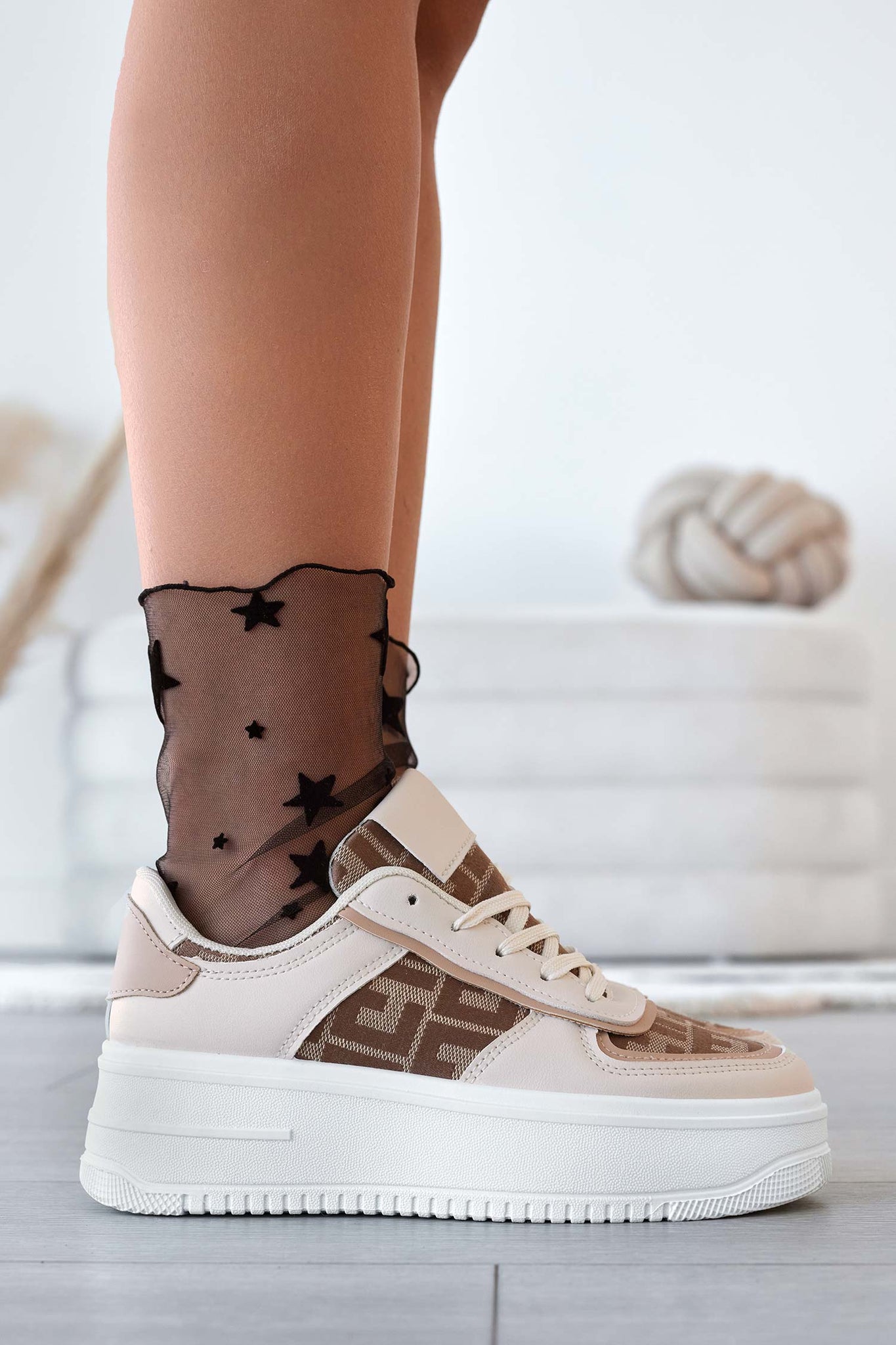 Beige sneakers with patterned fabric inserts