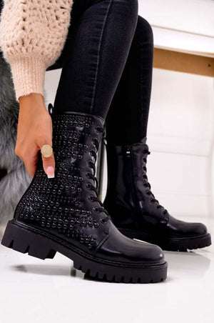 Black combat ankle boots with studs