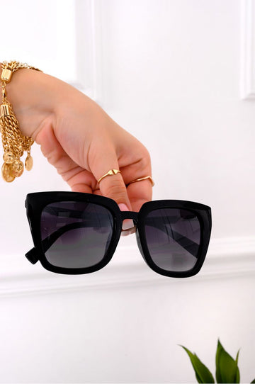 Black thick-frame sunglasses