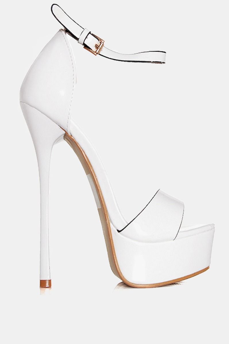 White high-heeled patent sandals