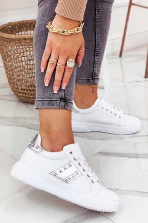 White sneakers with silver inserts and studs