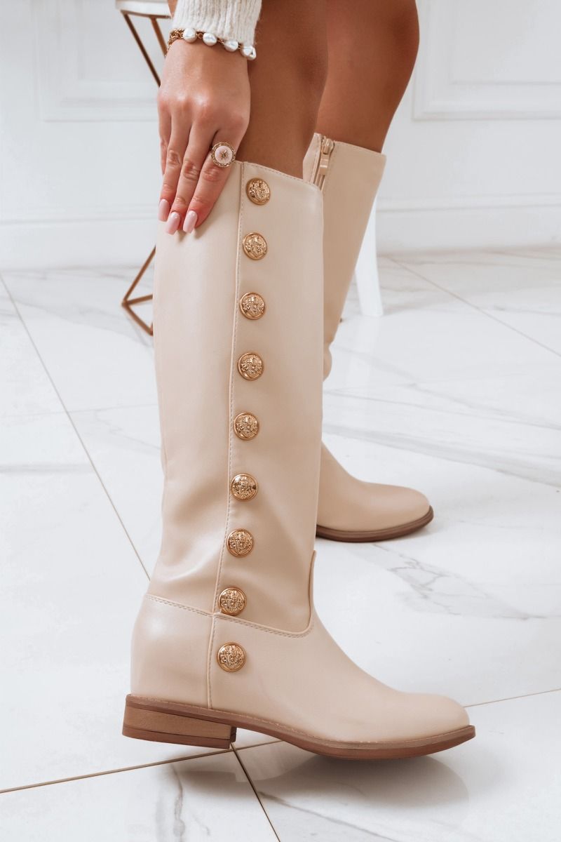 Bottes beiges avec boutons dorés et semelle compensée intérieure