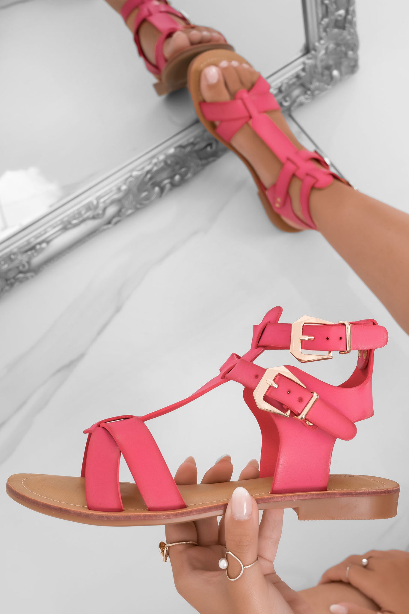 White low sandals with gold buckles