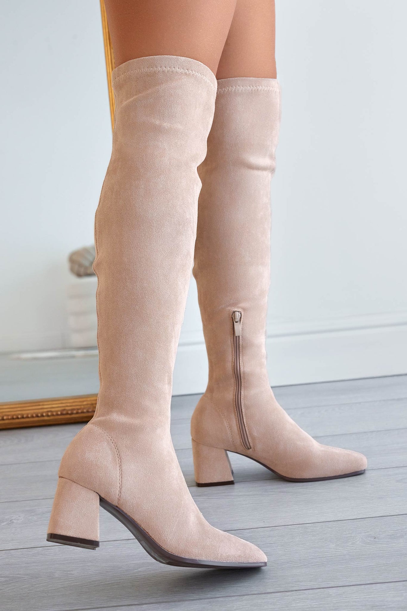 Beige suede over-the-knee boots