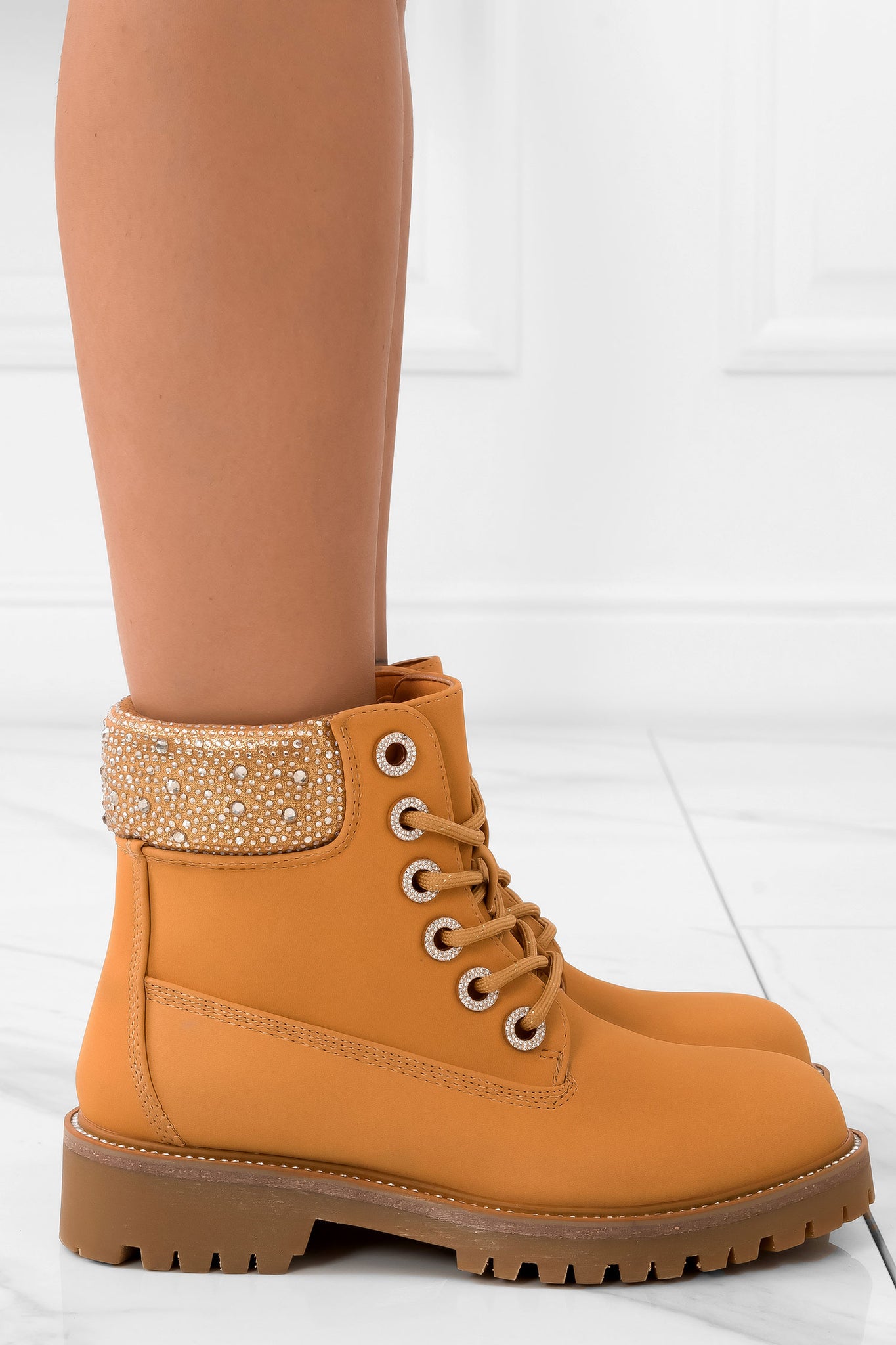 Camel combat boots with rhinestones on the edge