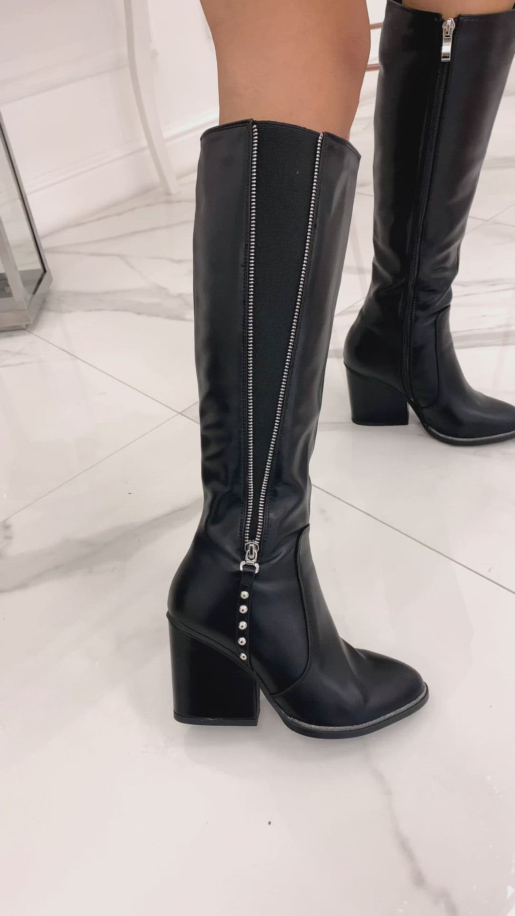 Stivali neri con elastico e zip laterale Alexoo
