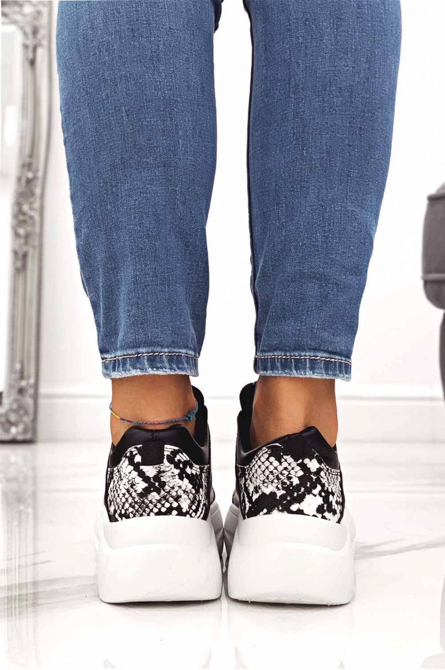 Black sneakers with python-effect inserts and laces