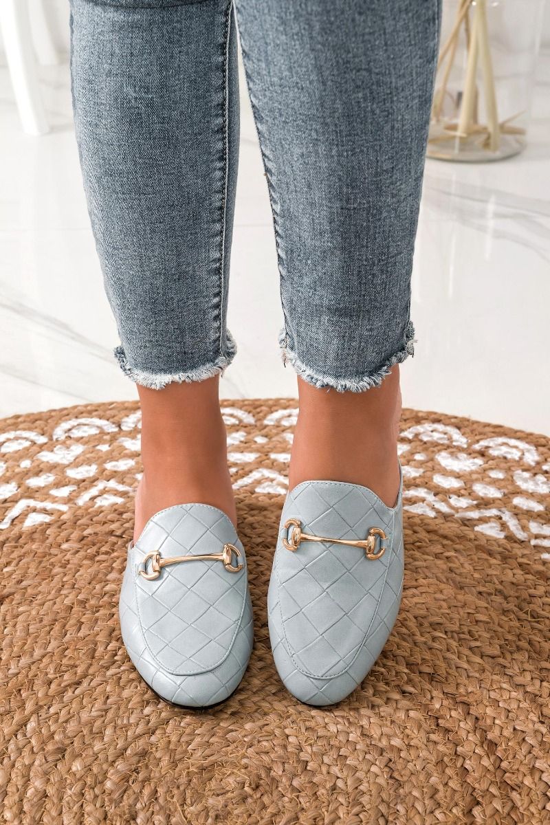 blue loafers with open back and checkered pattern