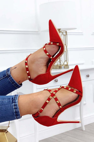 Red suede pumps with gold studs and high heel