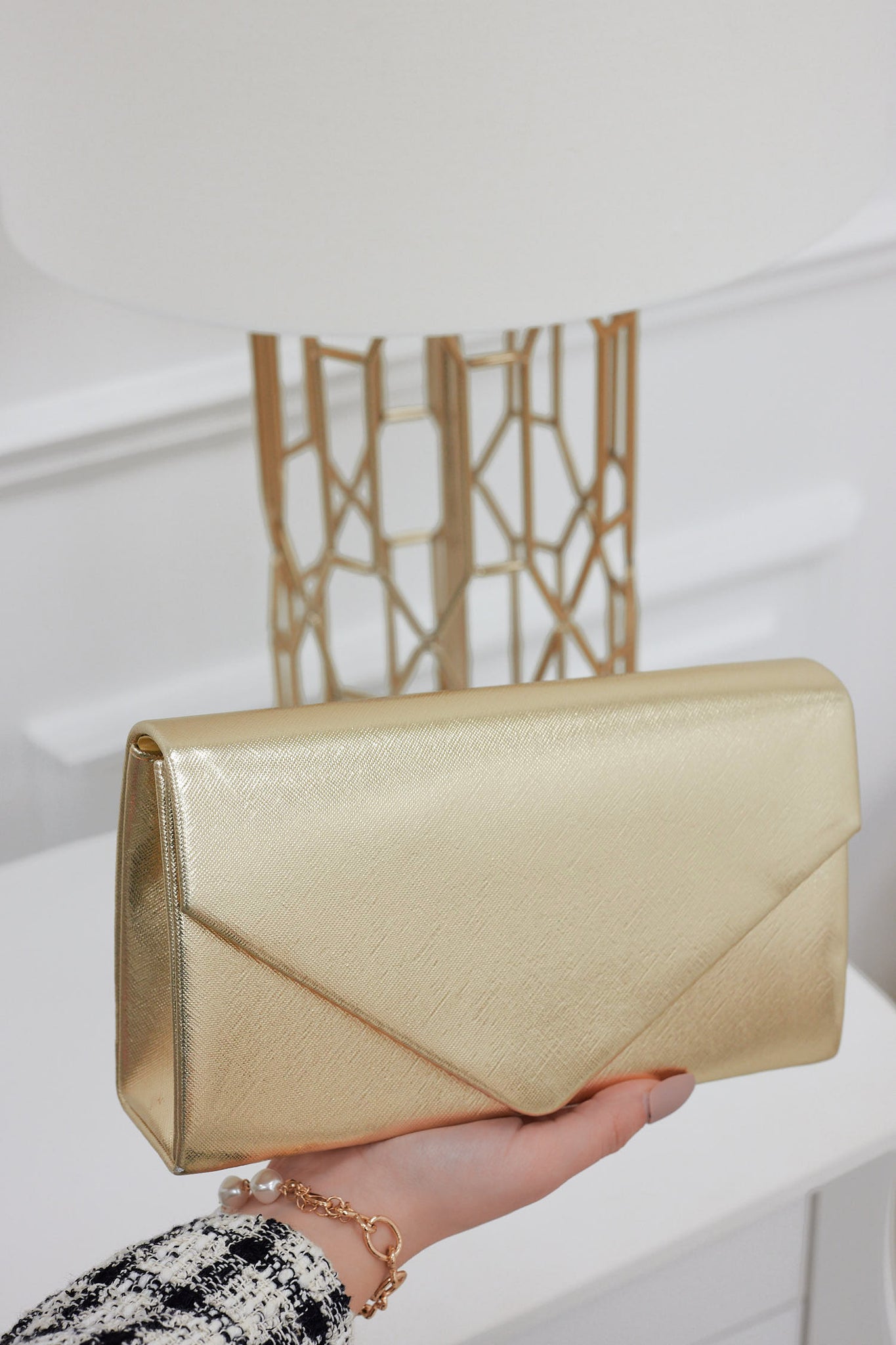 Metallic gold B210 clutch bag