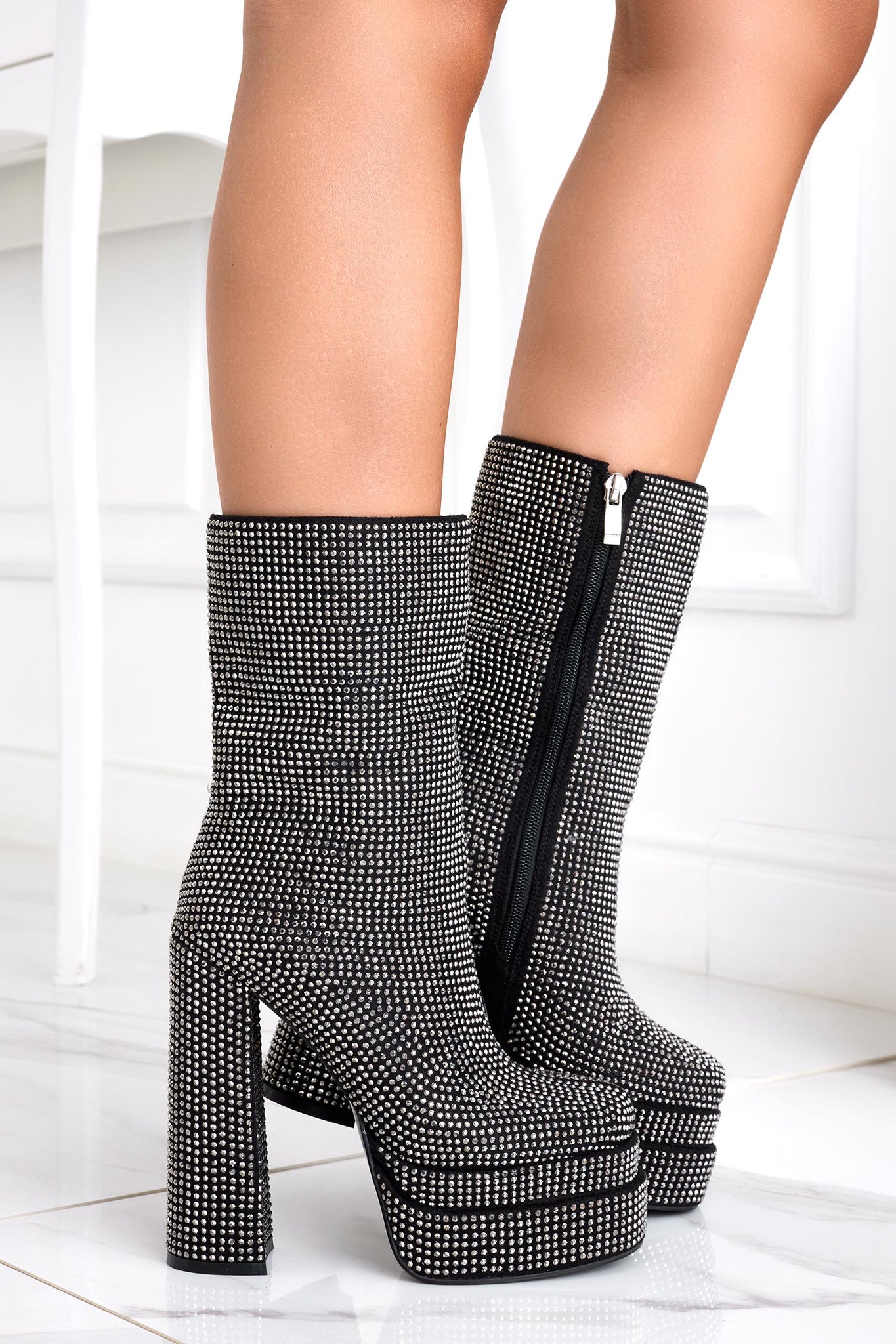 Black jeweled ankle boots with rhinestones