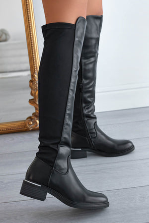 Black over-the-knee boots with stretch fabric at the back
