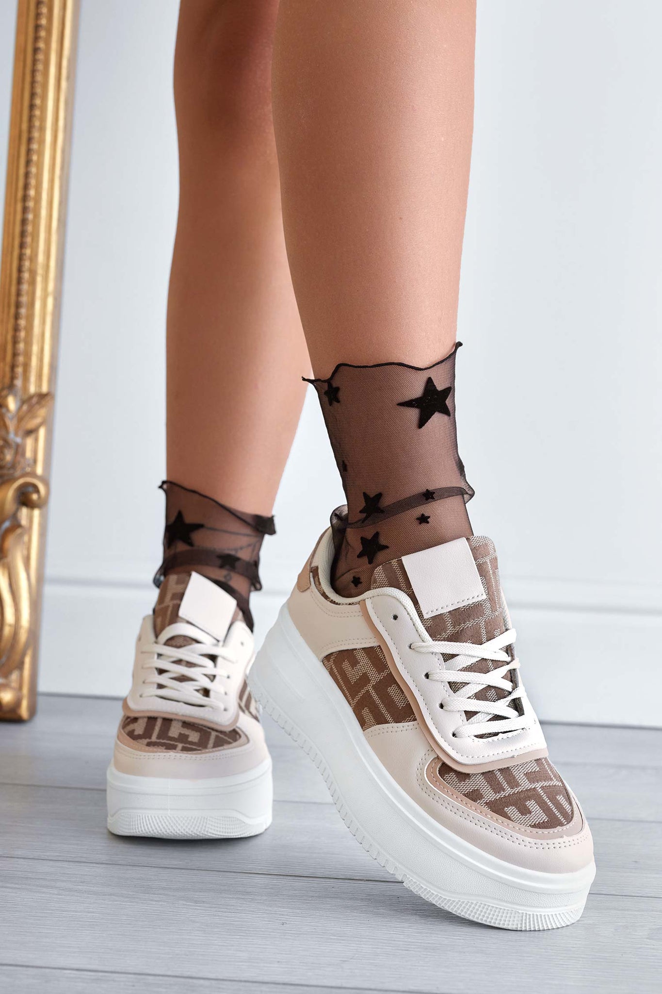Beige sneakers with patterned fabric inserts