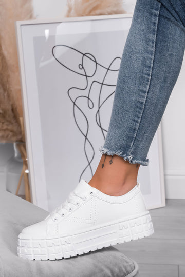 White sneakers with thick sole and laces