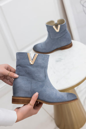 Blue suede ankle boots with internal wedge