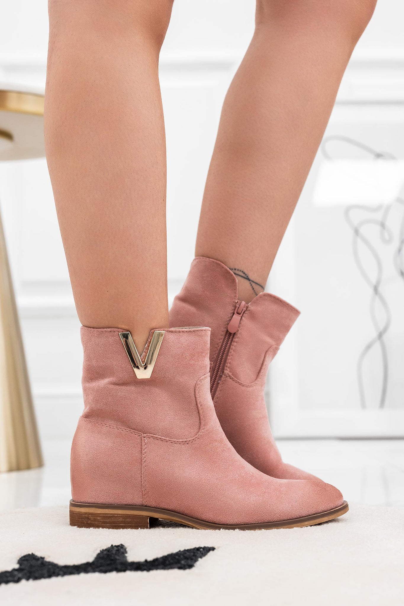 Pink suede ankle boots with internal wedge