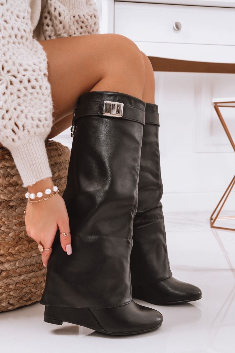Bottes noires à semelle compensée et revers