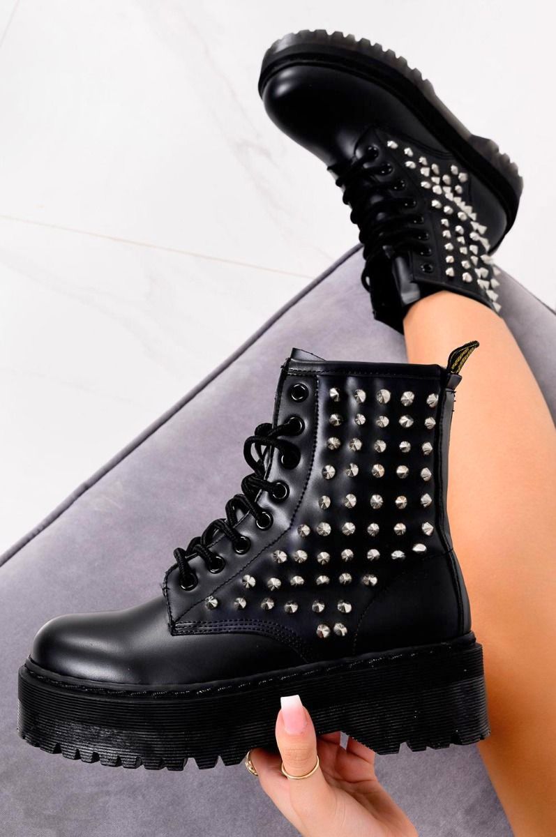 Black lace-up combat ankle boots with studs