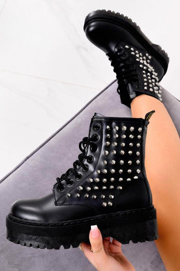 Black lace-up combat ankle boots with studs
