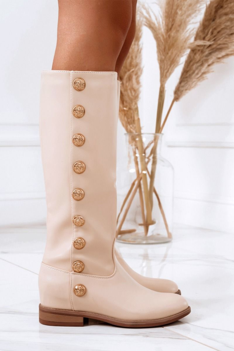 Bottes beiges avec boutons dorés et semelle compensée intérieure